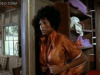 Stupidly Busty Nefarious Infant Pam Grier Unties Herself In Toothed Duds